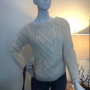 White cable knit crew neck sweater